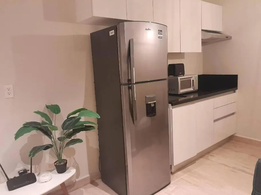 Comfortable Condo W/ City Views Rooftop Pool & Gym - 319 Musa Playa del Carmen Apartment